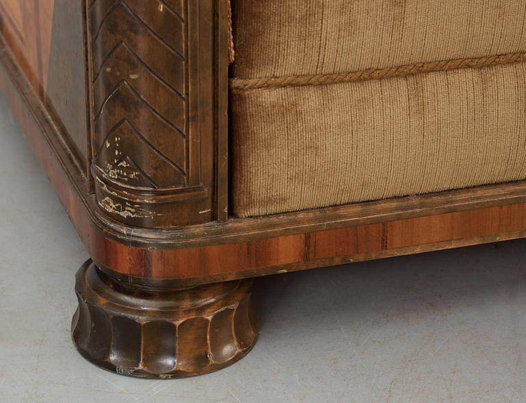 A Swedish 1930's stained birch sofa attributed to Alvar Andersson.