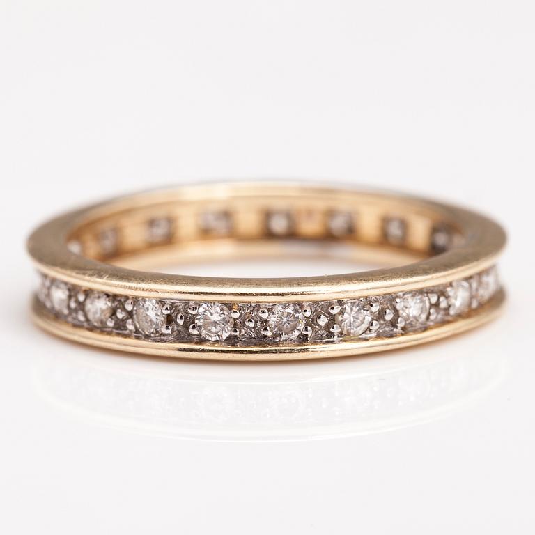 A 14K gold ring with diamonds ca. 0.21 ct in total. Timantttiset, Helsinki 2002.