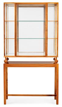 421. A Josef Frank cherrywood showcase cabinet, Svenskt Tenn, model 2077.