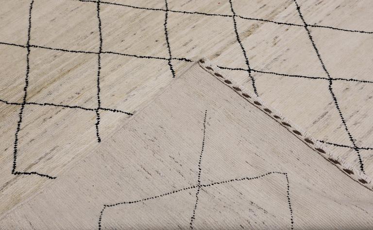 A Moroccan carpet, 235 x 158 cm.