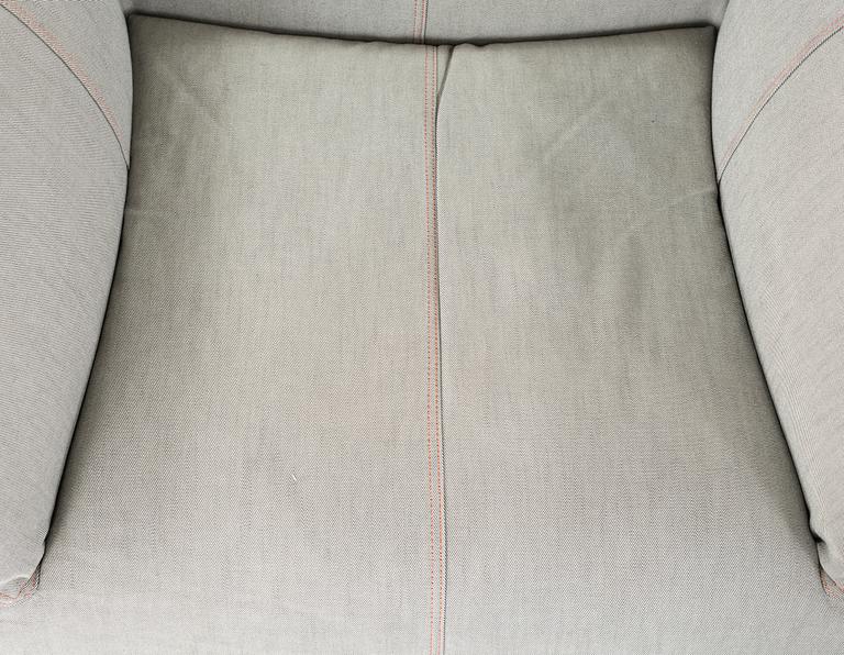 A "Le Bambole '07" armchair and a "Bambouff" footstool, designed by Mario Bellini, 21st century.