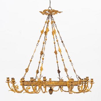 A gilt bronze sixteen-light Empire-style chandelier, later part of the 19th century.