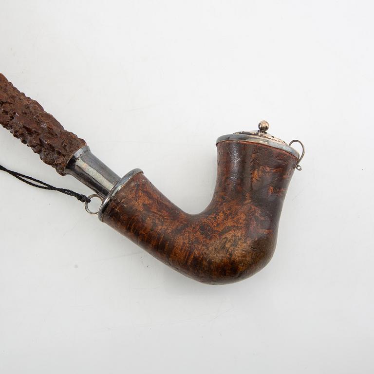 Long pipe  Carved wood with a silver mount Hasa Malmö 1986.