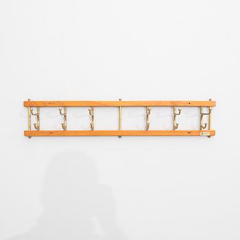 Klädhängare, "Dekorativ", Skoglunds metallgjuteri, Anderstorp, 1950/60-tal.