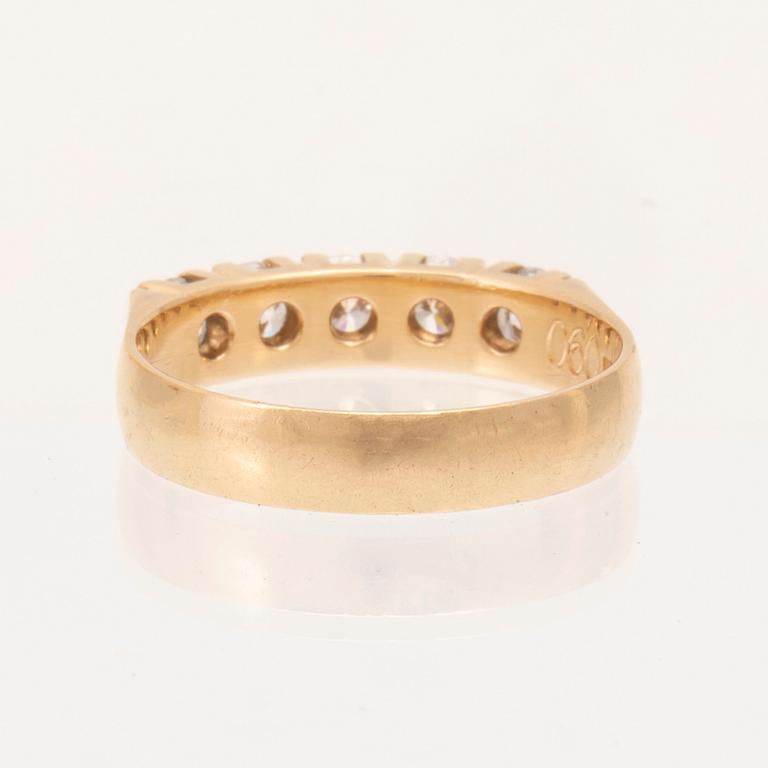 An 18K gold half eternity ring set with round brilliant cut diamonds, Wadring-Juvel Karlskrona 1986.