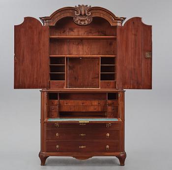 A Swedish rococo mahogany writing cabinet attributed to N. Dahlin (master in Stockholm-1761-87).