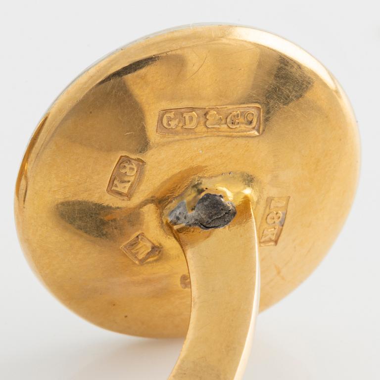Cufflinks with mother-of-pearl and brilliant-cut diamonds.