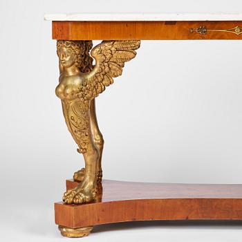 A presumably Austrian Empire centre table, early 19th century.