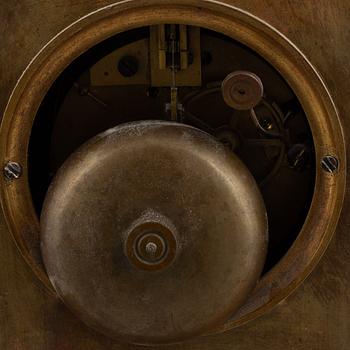 A patinated bronze mantel clock, by L.B.P. Japy & Cis, first half of the 19th century, Empire.