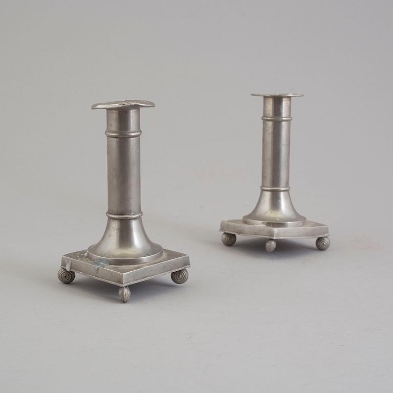 A pair of pewter candlesticks from Schreuder & Olsson Tenngjuteri, Stockholm, 1924.