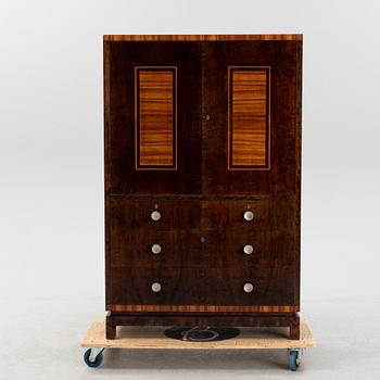 David Blomberg, a birch and rosewood veneered cabinet, 1930's.