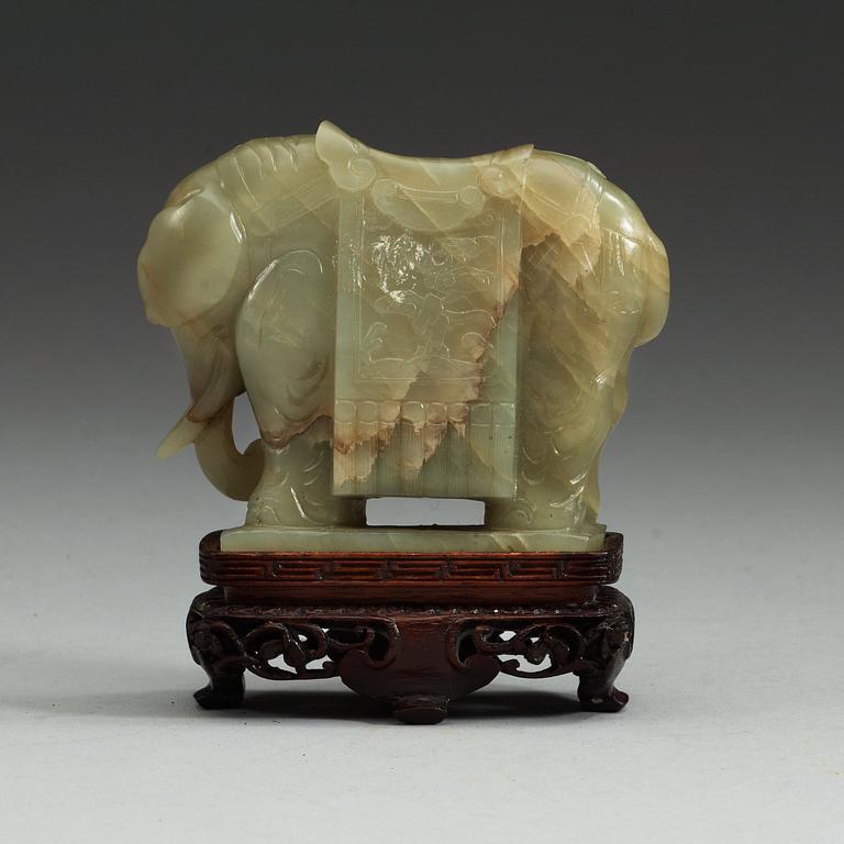 A nephrite figure of an elephant, presumably late Qing dynasty (1644-1912).