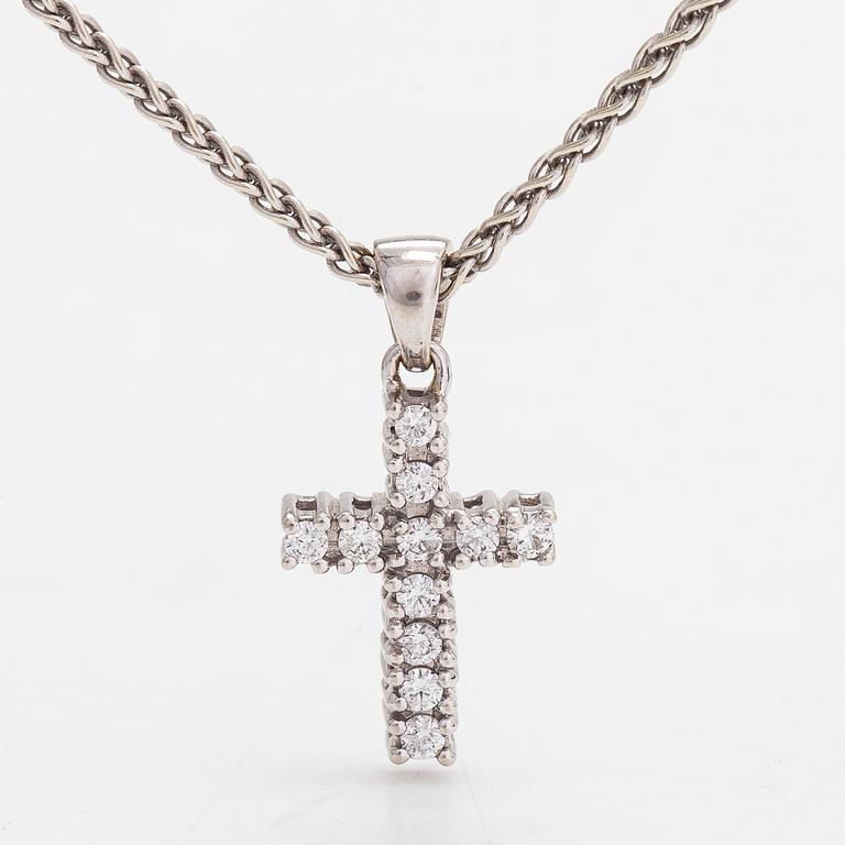 Necklace/pendant, cross, 14K white gold with diamonds totalling approx. 0.25 ct. Finnish hallmarks.