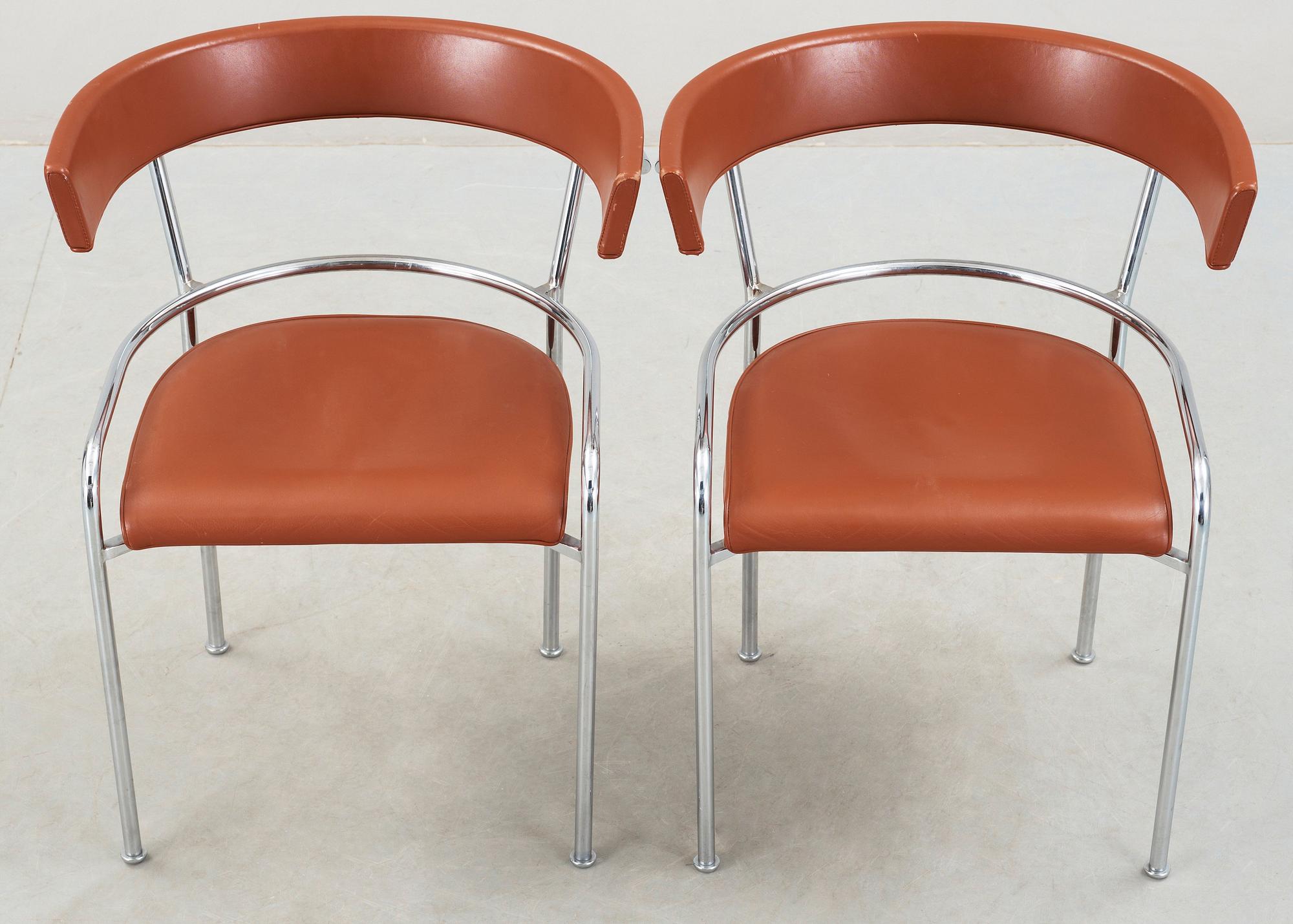 A pair of Gunnar Asplund chromed steel and leather armchairs by Källemo, Sweden post 1988.