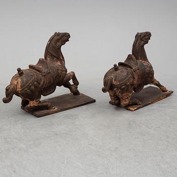 Two large wooden sculptures of horses, 20th century.