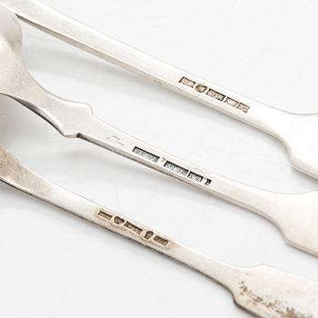 Silver spoons, 29 pcs, and sugar tongs with shell motif mostly by Kuopion Kultaseppä oy, Kuopio, 1919-53.