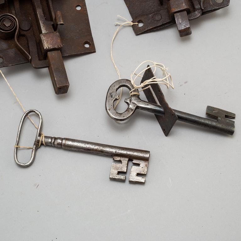 Two iron door locks with keys, 18th or early 19th century.