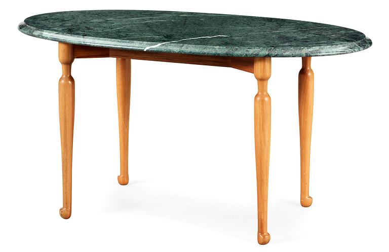 A Josef Frank green marble top table and mahogany by Svenskt Tenn.