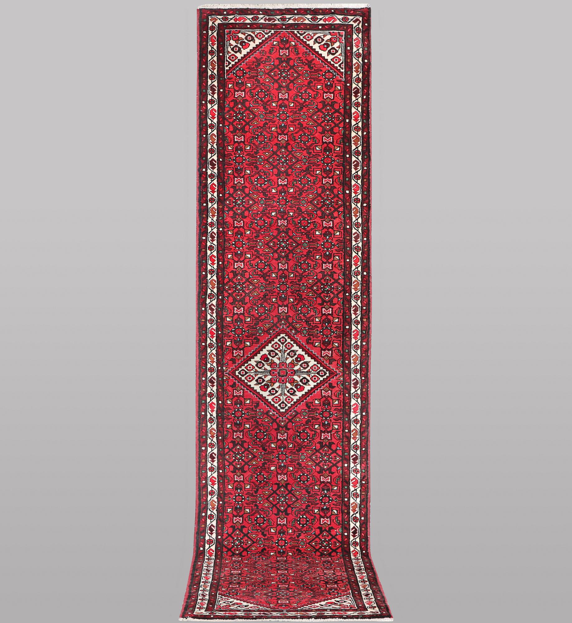 A runner carpet, Hosseinabad, ca 393 x 82 cm.