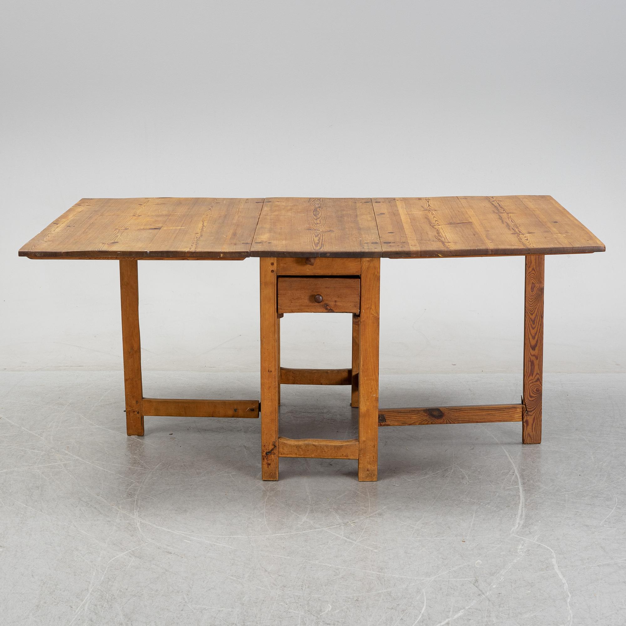 A 19th century gate-leg table.