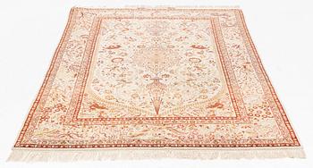 A signed part silk Esfahan rug, ca 233 x 147 cm (as well as 3 cm flat weave on each side).