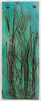 Toini Muona, a stoneware relief, signed TM.