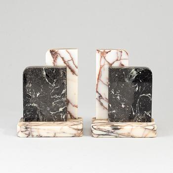 A pair of art déco marble book ends, 1930s.