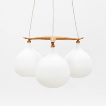 Uno & Östen Kristiansson, an oak and glass three-light ceiling lamp, Luxus, Vittsjö.