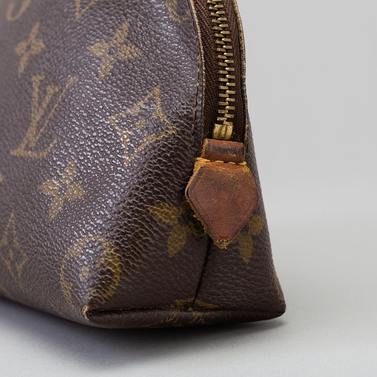 a LOUIS VUITTON make-up bag.