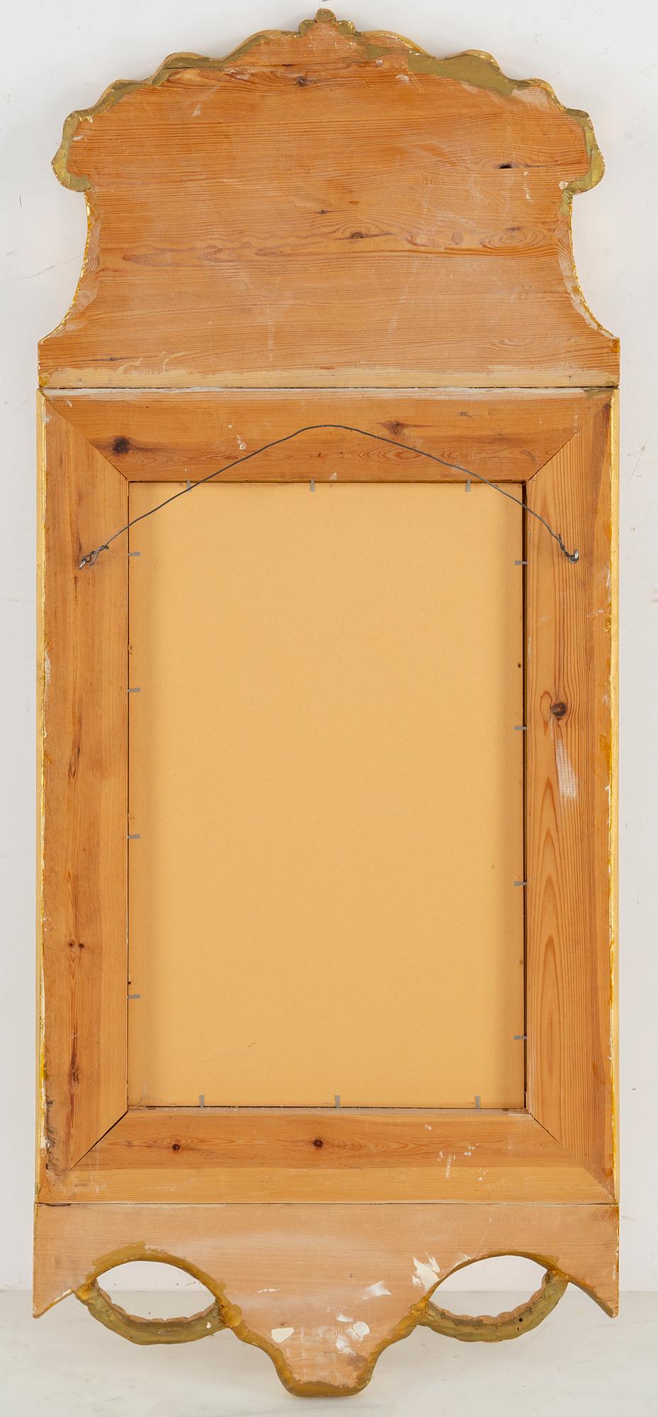 An empire style mirror, 20th century.
