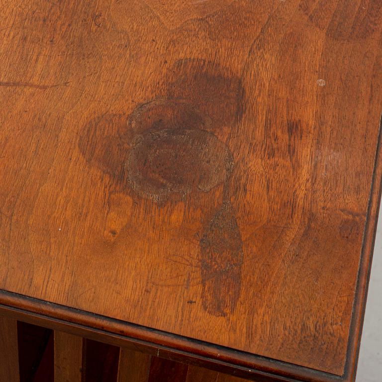 A revolving book stand, 20th century latter part.