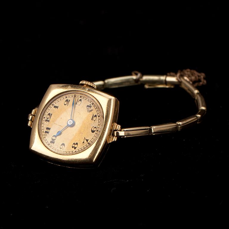 ARMBANDSUR, dam, guld 14K och 18K. 1920-tal. Totalvikt 19 g.