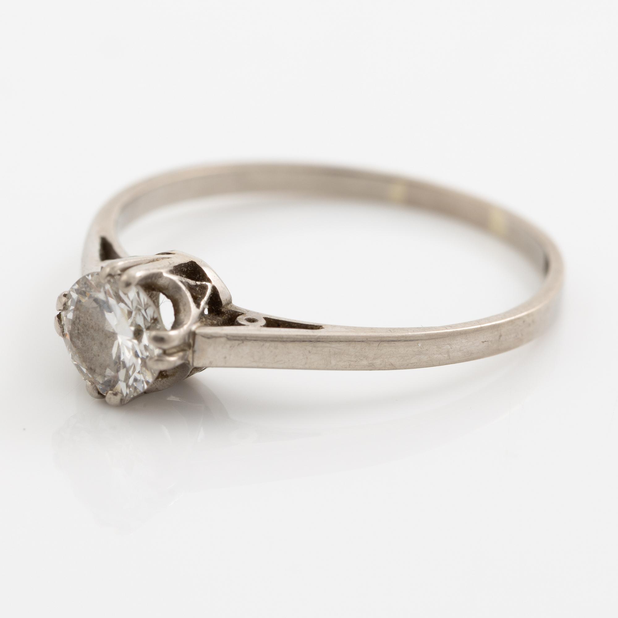 Ring, 18K white gold with brilliant-cut diamond.