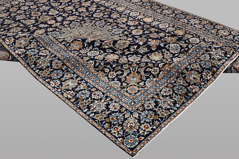 A carpet, Kashan, ca 391 x 286 cm.