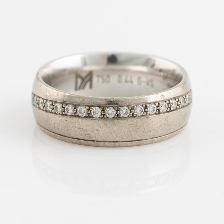 White gold and brilliant cut diamond ring.