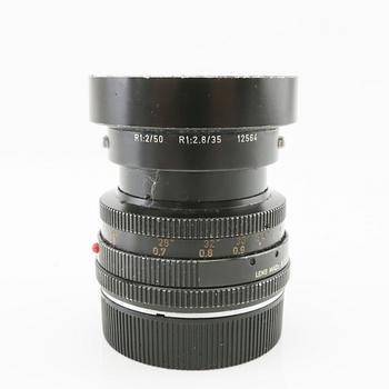 Leica camera with 4 lenses.