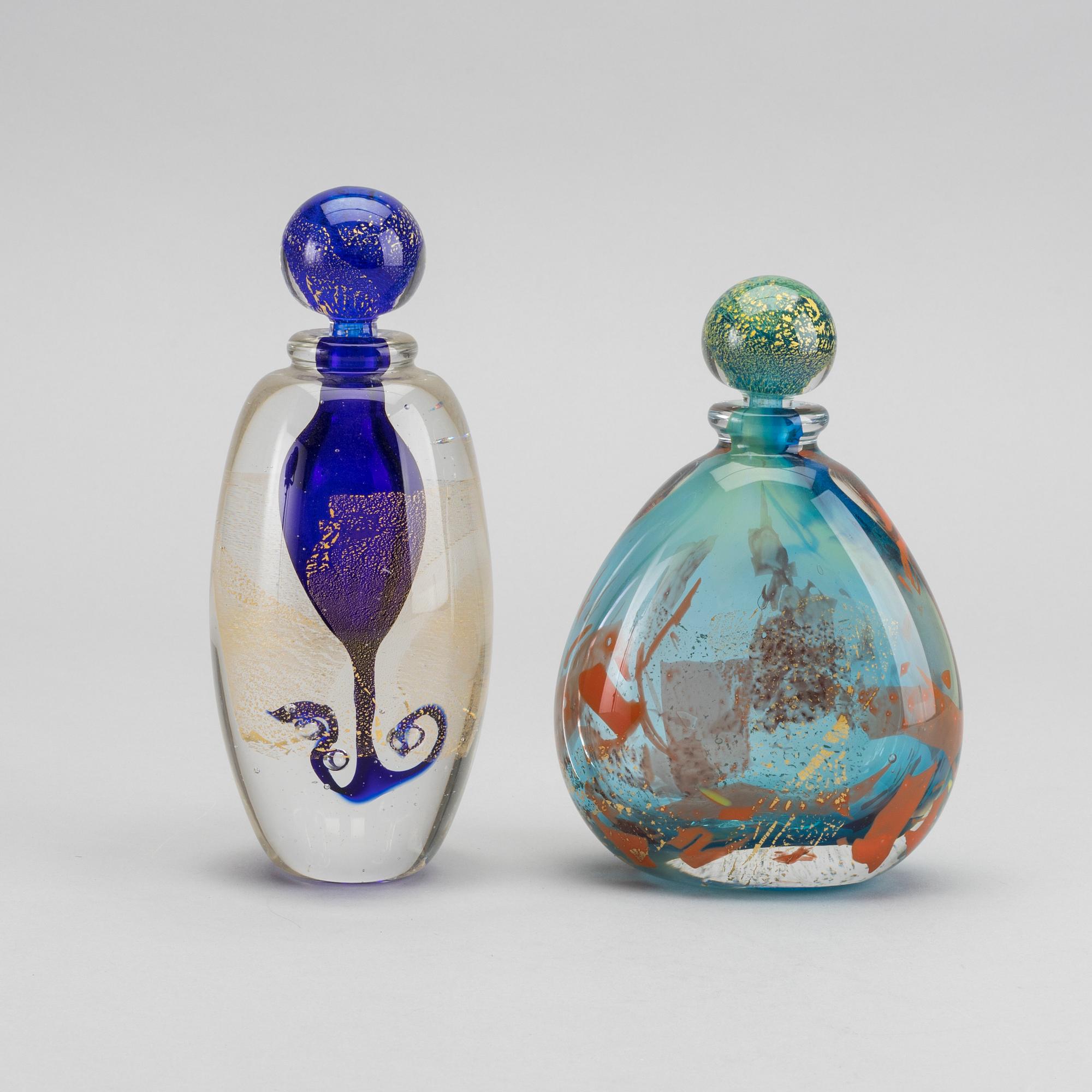 MARCEL SABA, a set of two signed glass flacons.