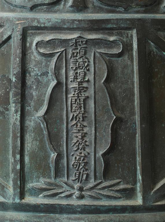 A large dated bronze Buddhist temple bell, Qing dynasty (1644-1912).