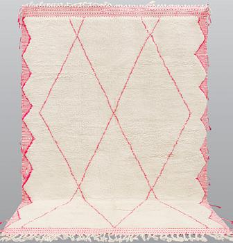 A Moroccan carpet, approx. 312 x 210 cm.