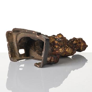 A Chinese gilt lacquered figure of a daoist deity, Ming dynasty (1368-1644).