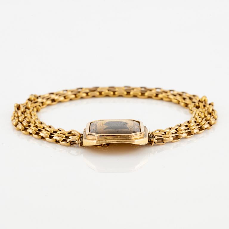 Armband 18K guld med silluettporträtt, sengustavianskt, 1700/1800-tal.
