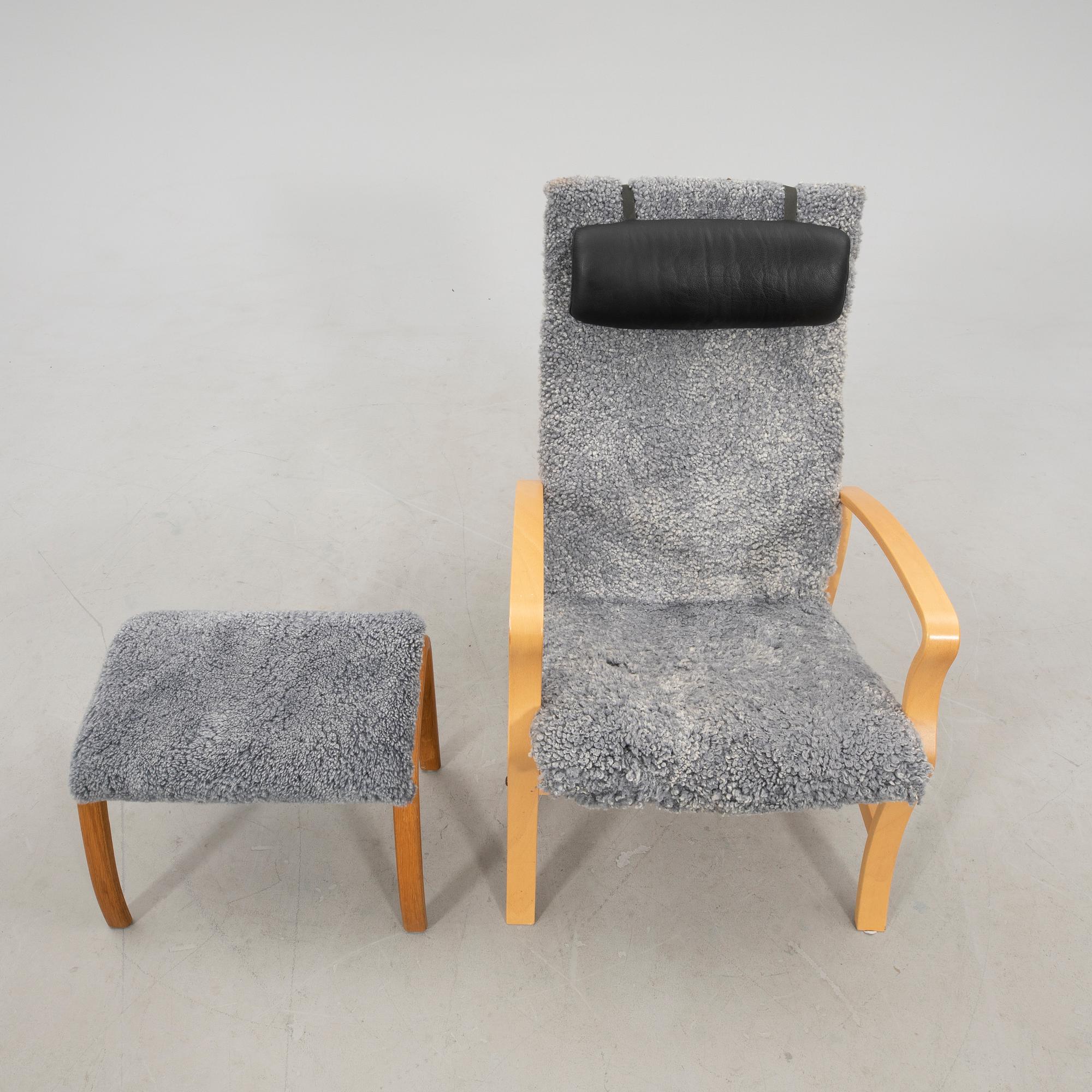 Armchair with footstool 
