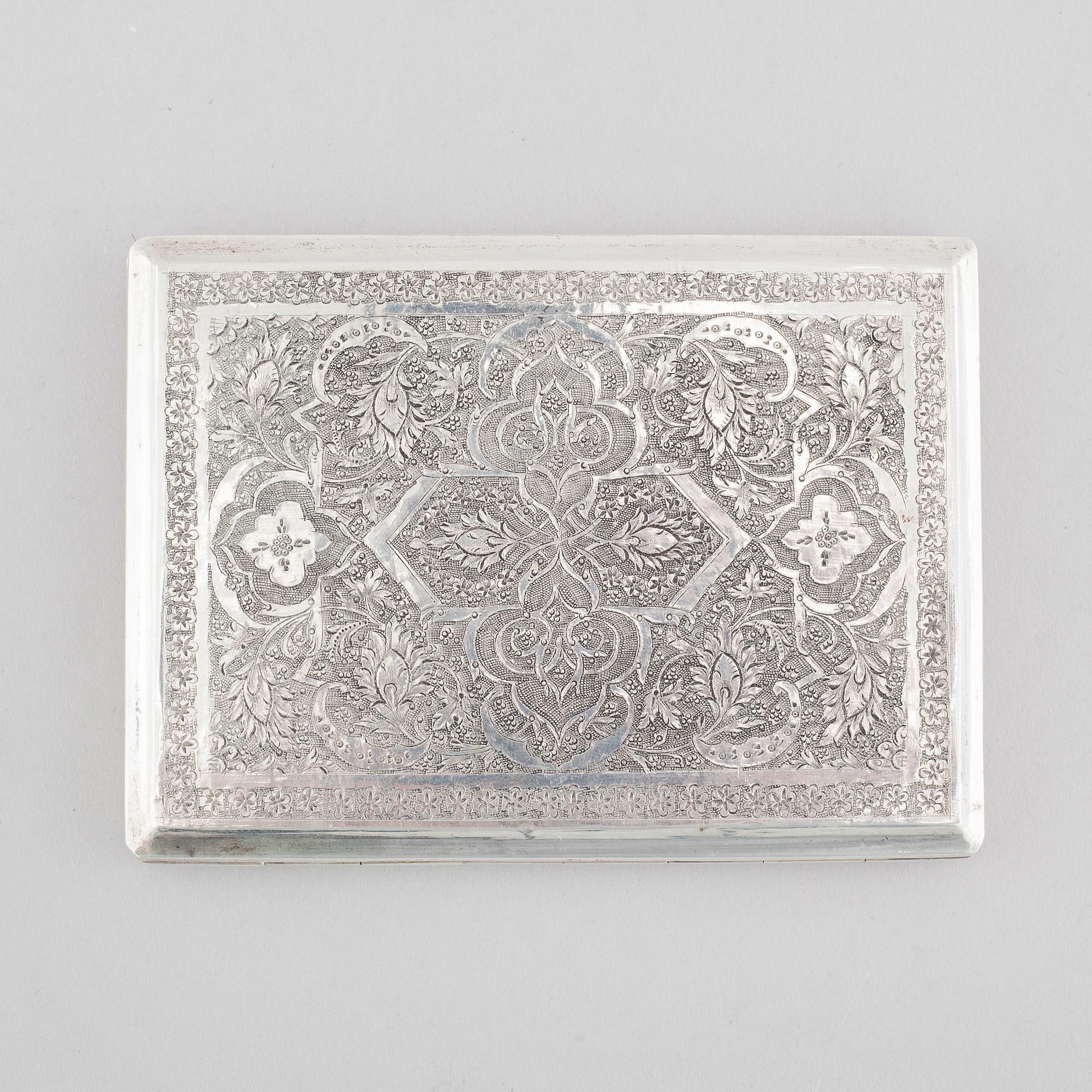 A cigarette case in silver, Persia/Iran, unidentified marks. Total weight 151 g.