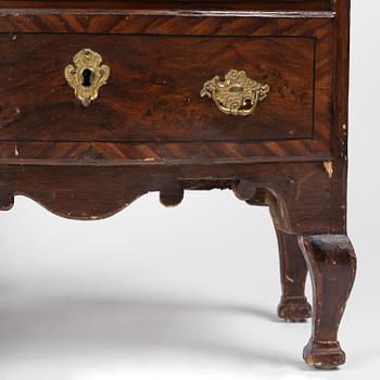 A Swedish late baroque faux bois commode, mid 18th century.