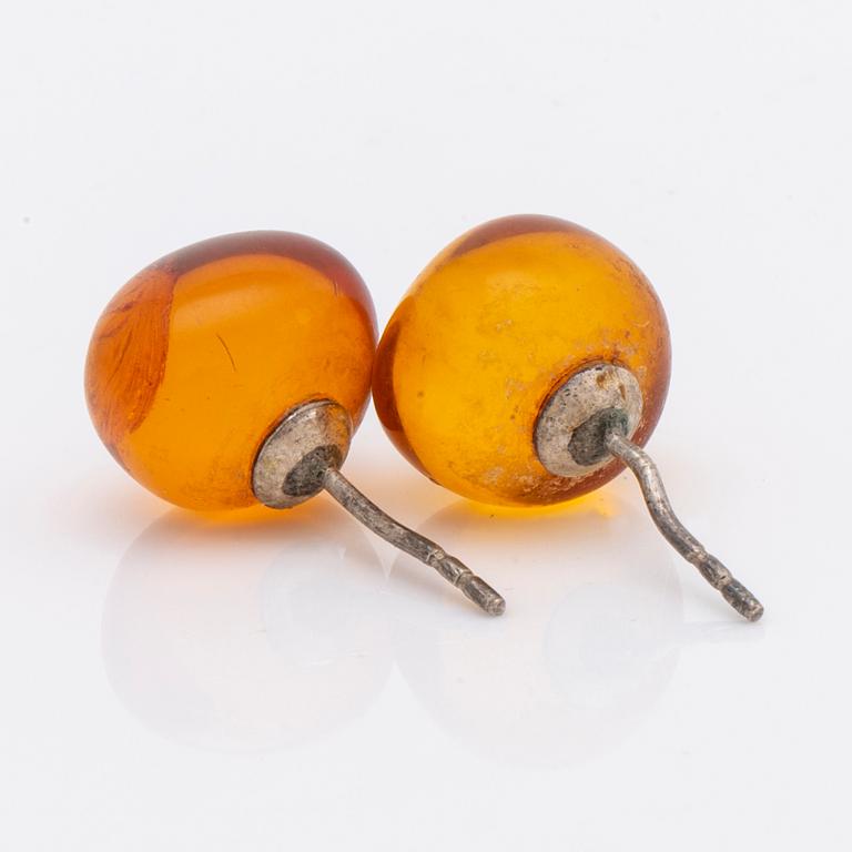 Amber set in silver, pendant, ring and earrings.