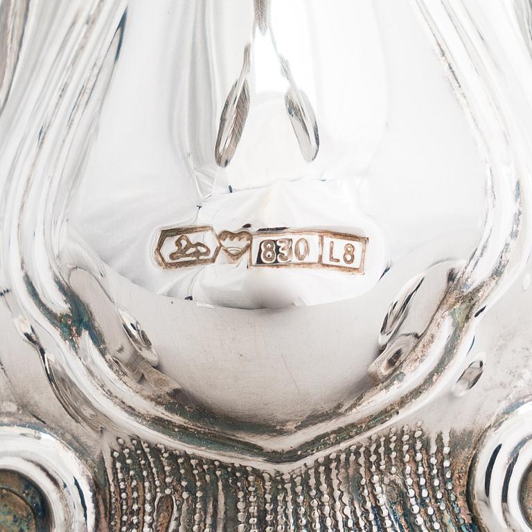 Kynttelikkö, hopeaa, Kultakeskus, Hämeenlinna 1987-88.