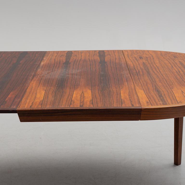 A 1950s/1960s rosewood veneer table.