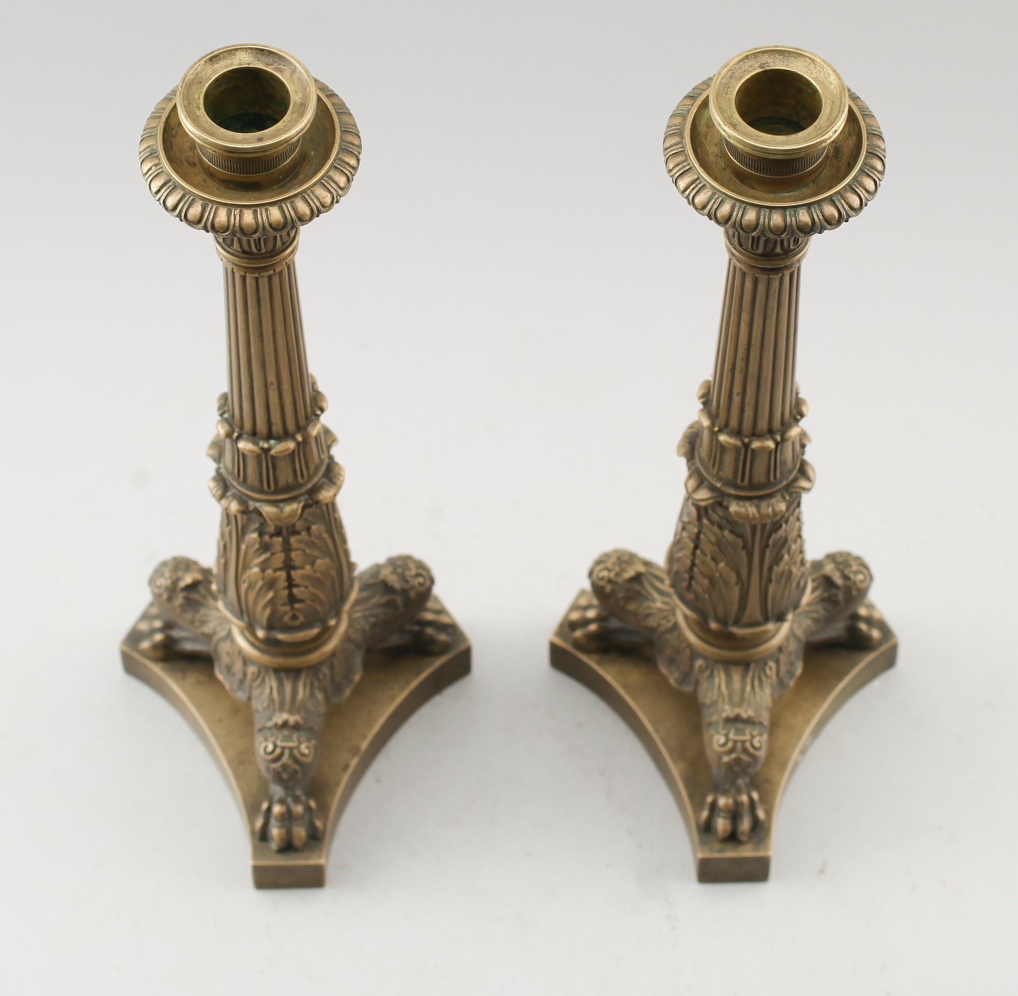 LJUSSTAKAR, 1 par, brons, senempire, omkring år 1830.