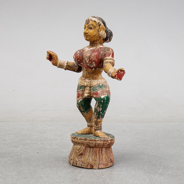 A carved and painted Indian religious effigy, ca. 1900.