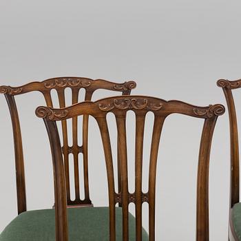 A late 20th century 10 piece Chippendale dining group.
